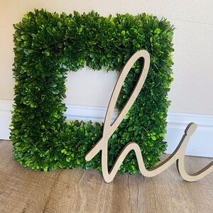 Door wreath and hanging sign